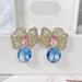 Fashionable colored zirconium petals light luxury earrings