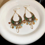 Fine-Crafted Rhinestone Dangle Earrings with Resin and Alloy Detail