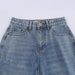 Women’s Loose-Fit Mid-Rise Jeans with Distressed Ripped Detailingn