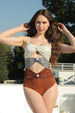 Women's Two-Piece Swimsuit with Hollow-Out Pearl Accents and Stylish Contrast