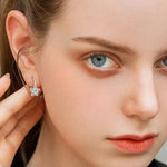 1.2 Carat Moissanite Flower Huggie Earrings in 925 Sterling Silver