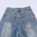 Women’s Loose-Fit Mid-Rise Jeans with Distressed Ripped Detailingn